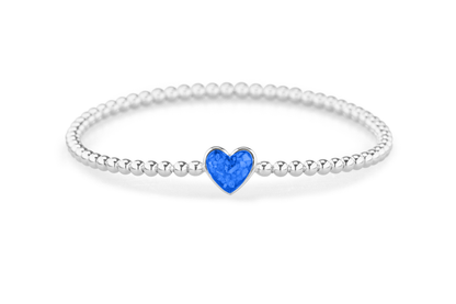 Flexibele as armband met hart als compartiment voor as of haar, gedenksieraden. Blue