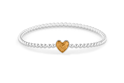Flexibele as armband met hart als compartiment voor as of haar, gedenksieraden. Gold