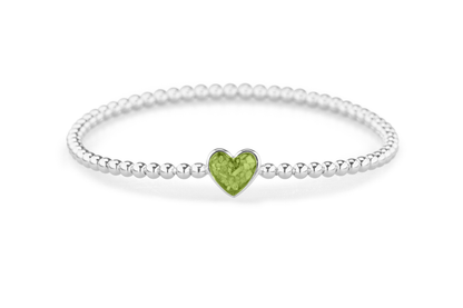 Flexibele as armband met hart als compartiment voor as of haar, gedenksieraden. Green
