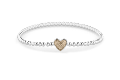 Flexibele as armband met hart als compartiment voor as of haar, gedenksieraden. Transparent