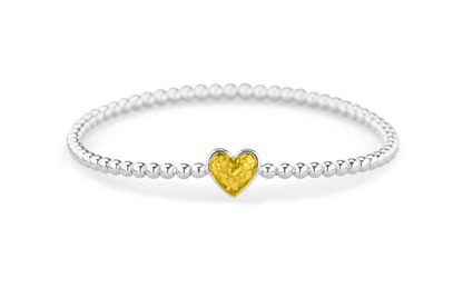 Flexibele as armband met hart als compartiment voor as of haar, gedenksieraden. Yellow