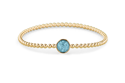 Flexibele as armband met rondje als compartiment voor as of haar, gedenksieraden. Baby