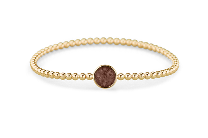 Flexibele as armband met rondje als compartiment voor as of haar, gedenksieraden. Brown