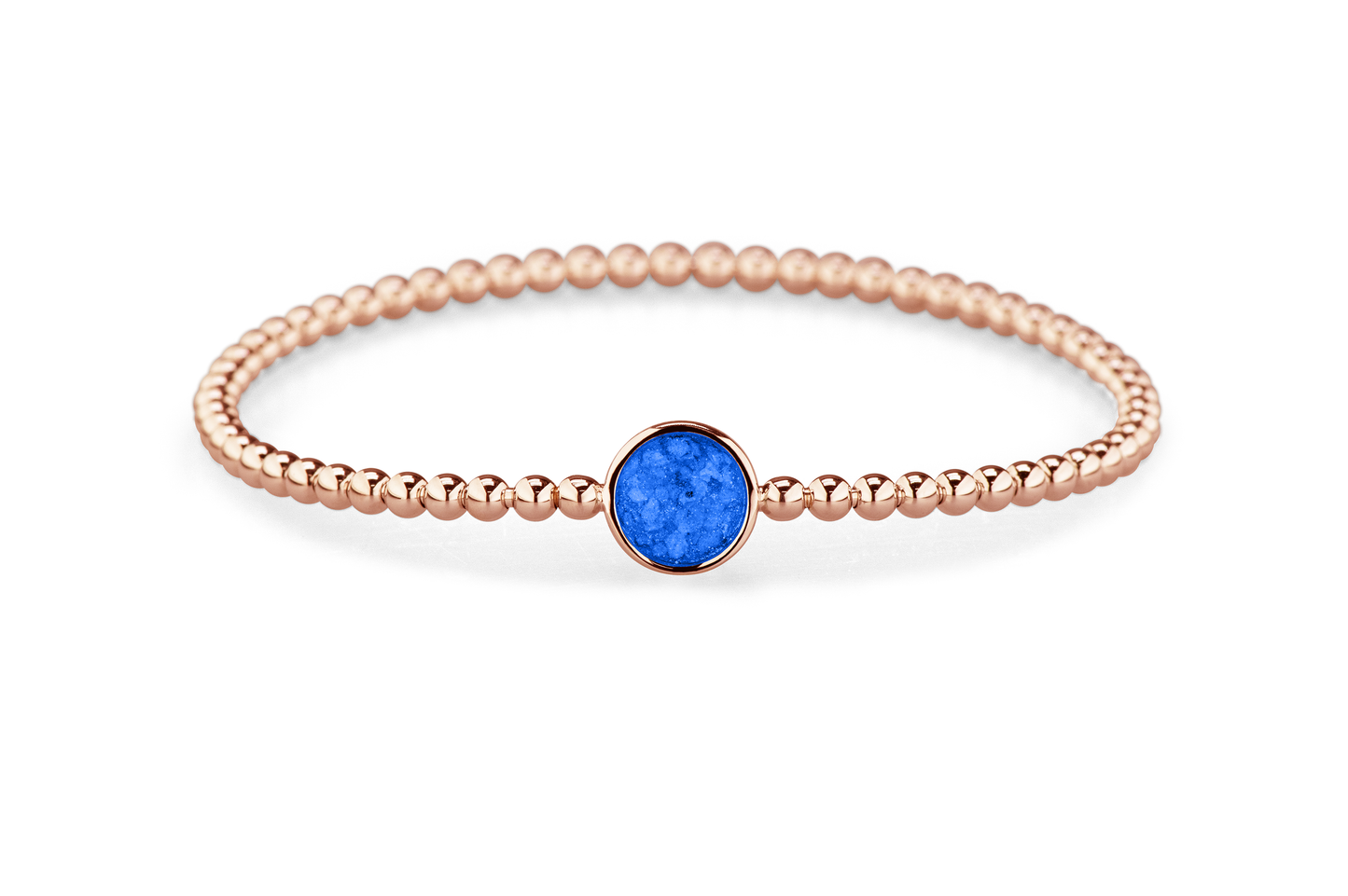 Flexibele as armband met rondje als compartiment voor as of haar, gedenksieraden. Blue