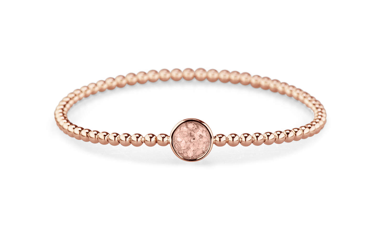 Flexibele as armband met rondje als compartiment voor as of haar, gedenksieraden. Blush