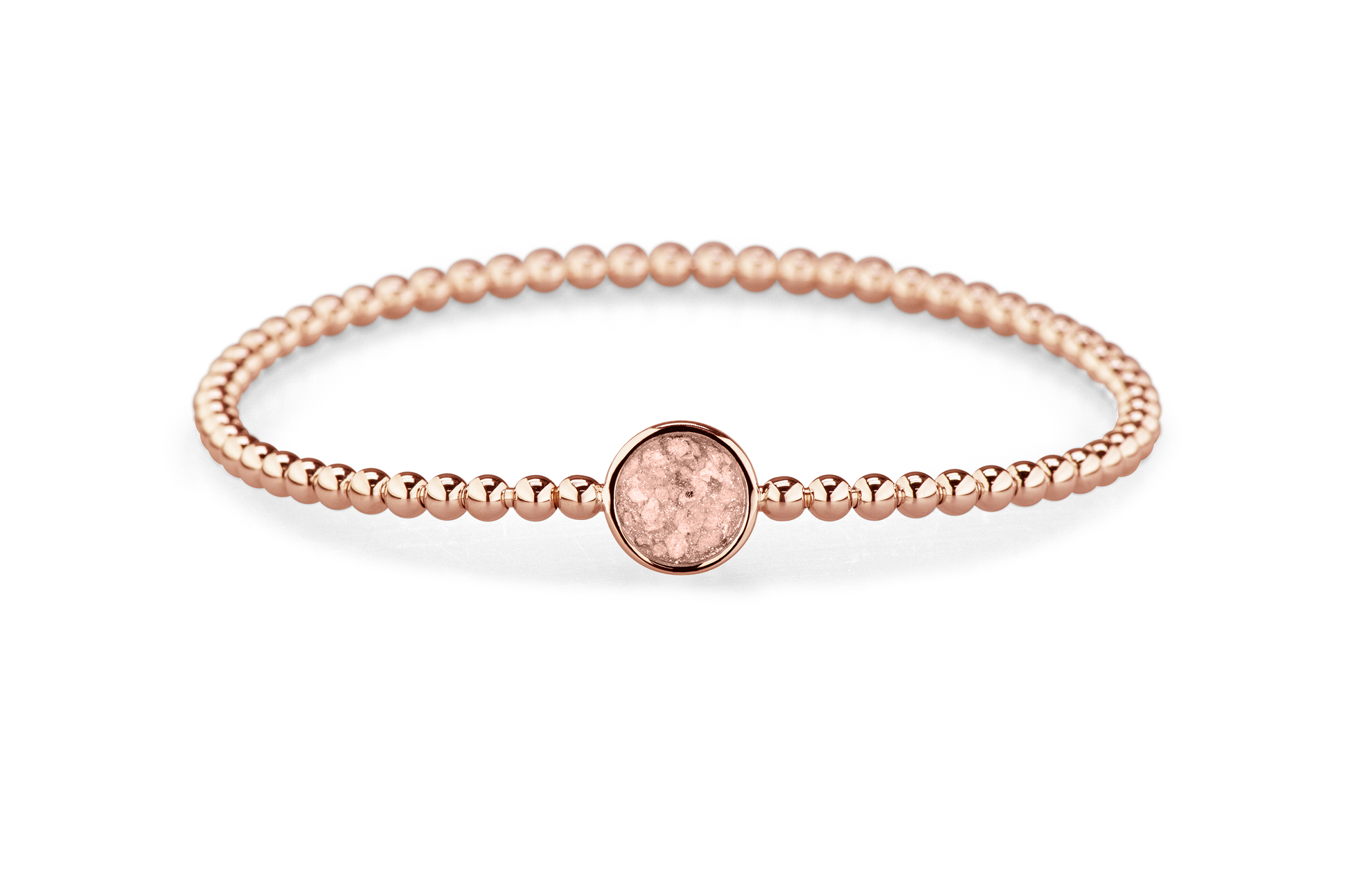 Flexibele as armband met rondje als compartiment voor as of haar, gedenksieraden. Blush