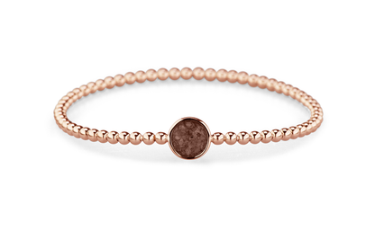 Flexibele as armband met rondje als compartiment voor as of haar, gedenksieraden. Brown