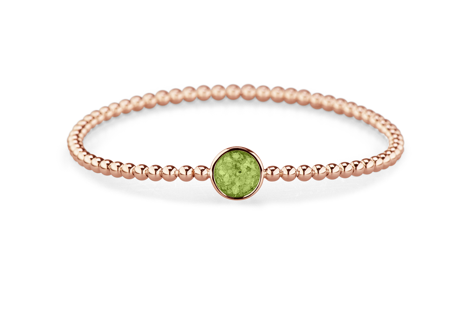 Flexibele as armband met rondje als compartiment voor as of haar, gedenksieraden. Green
