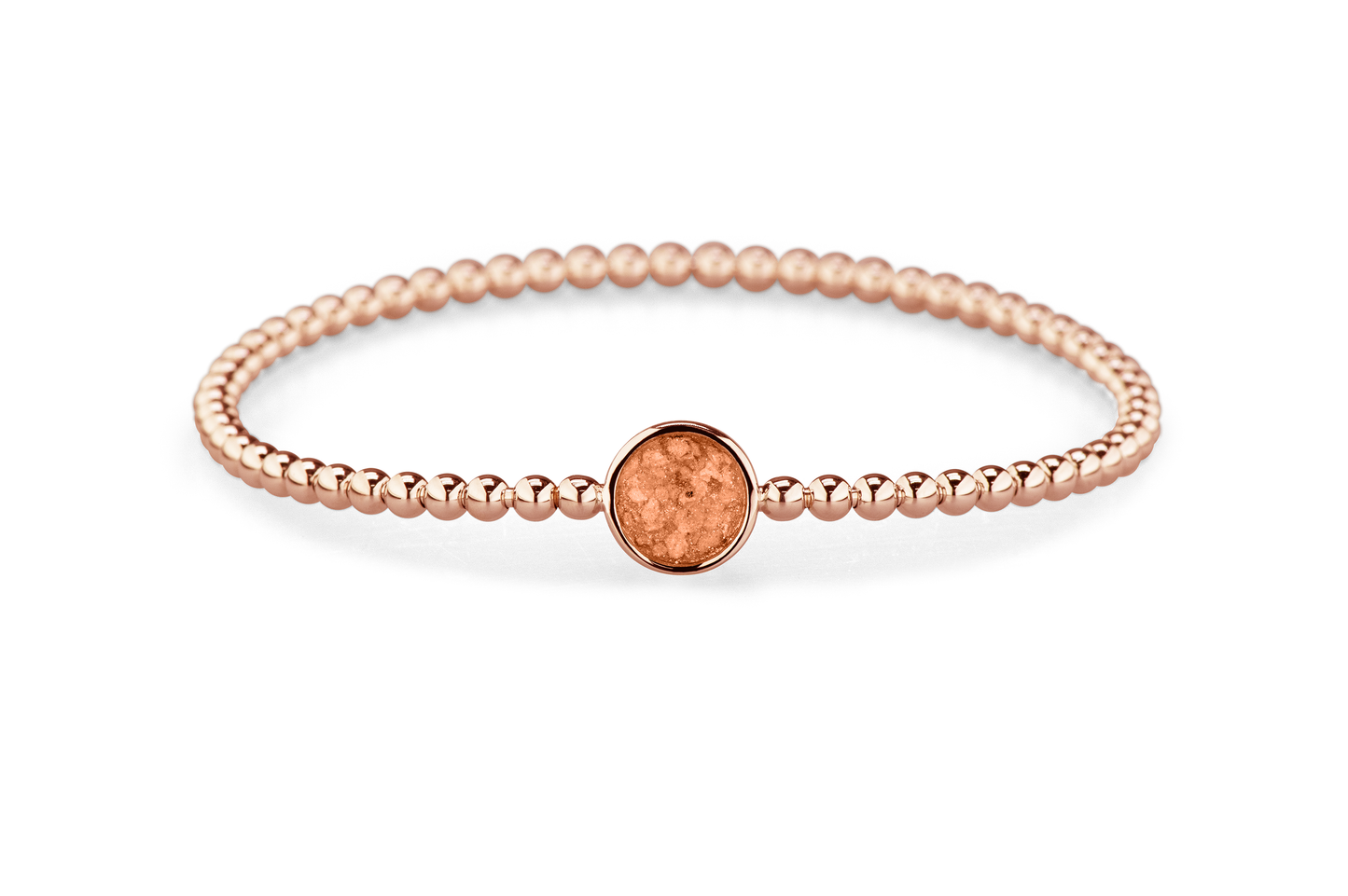 Flexibele as armband met rondje als compartiment voor as of haar, gedenksieraden. Orange