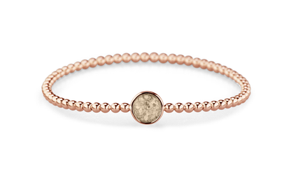 Flexibele as armband met rondje als compartiment voor as of haar, gedenksieraden. Transparent