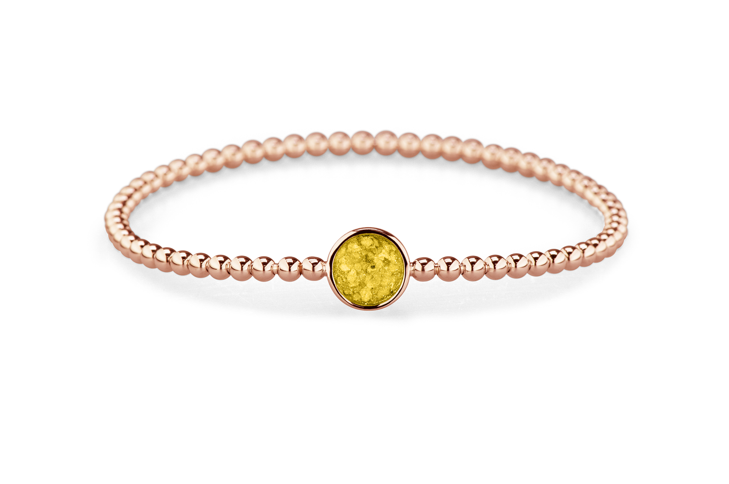 Flexibele as armband met rondje als compartiment voor as of haar, gedenksieraden. Yellow
