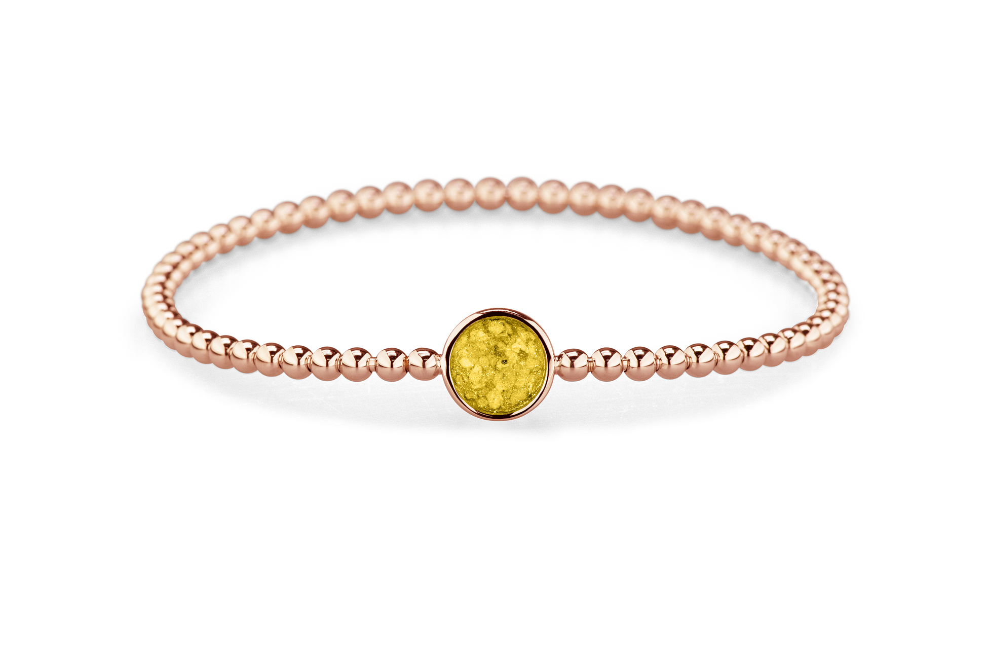 Flexibele as armband met rondje als compartiment voor as of haar, gedenksieraden. Yellow