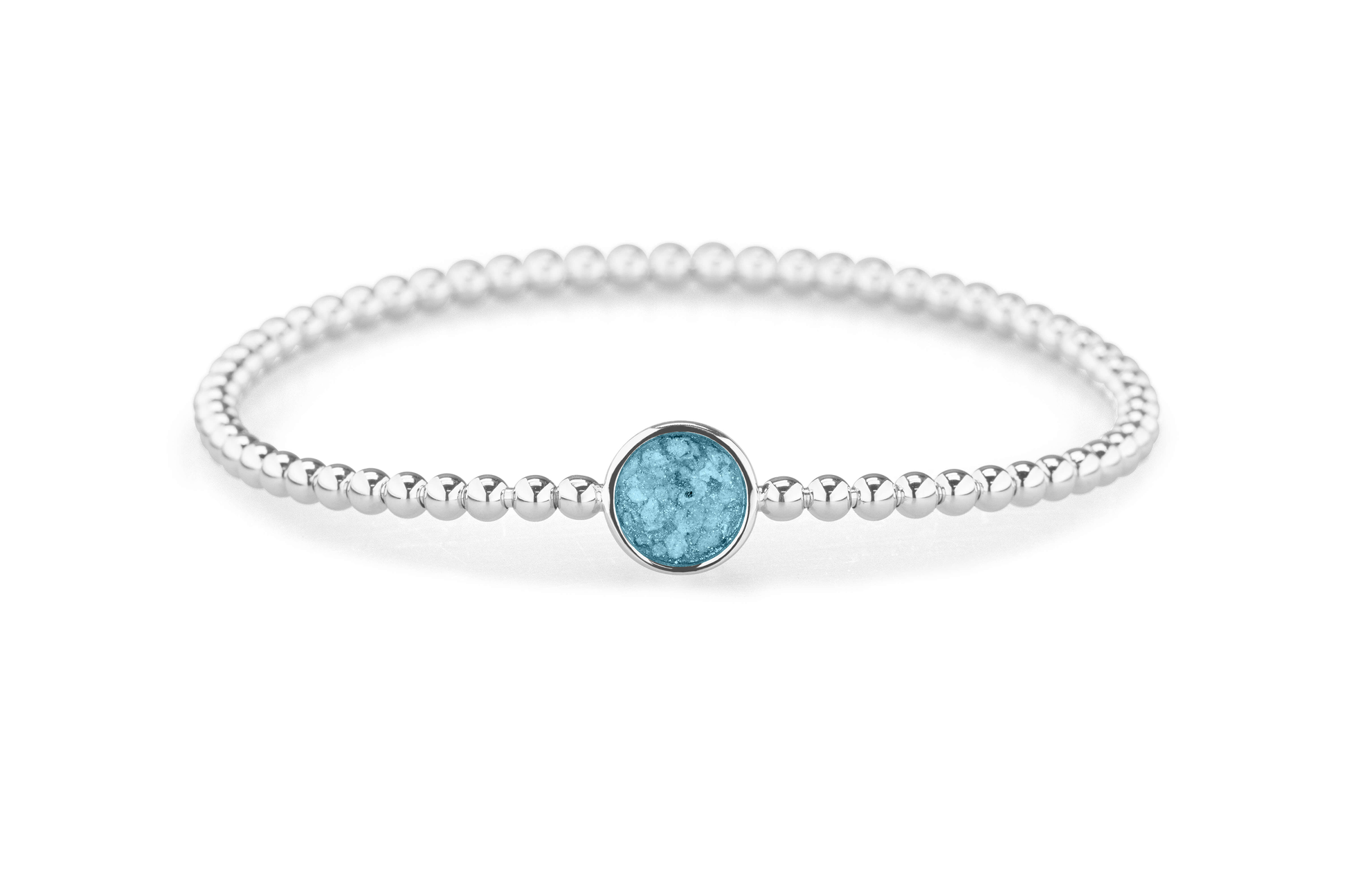 Flexibele as armband met rondje als compartiment voor as of haar, gedenksieraden. Baby