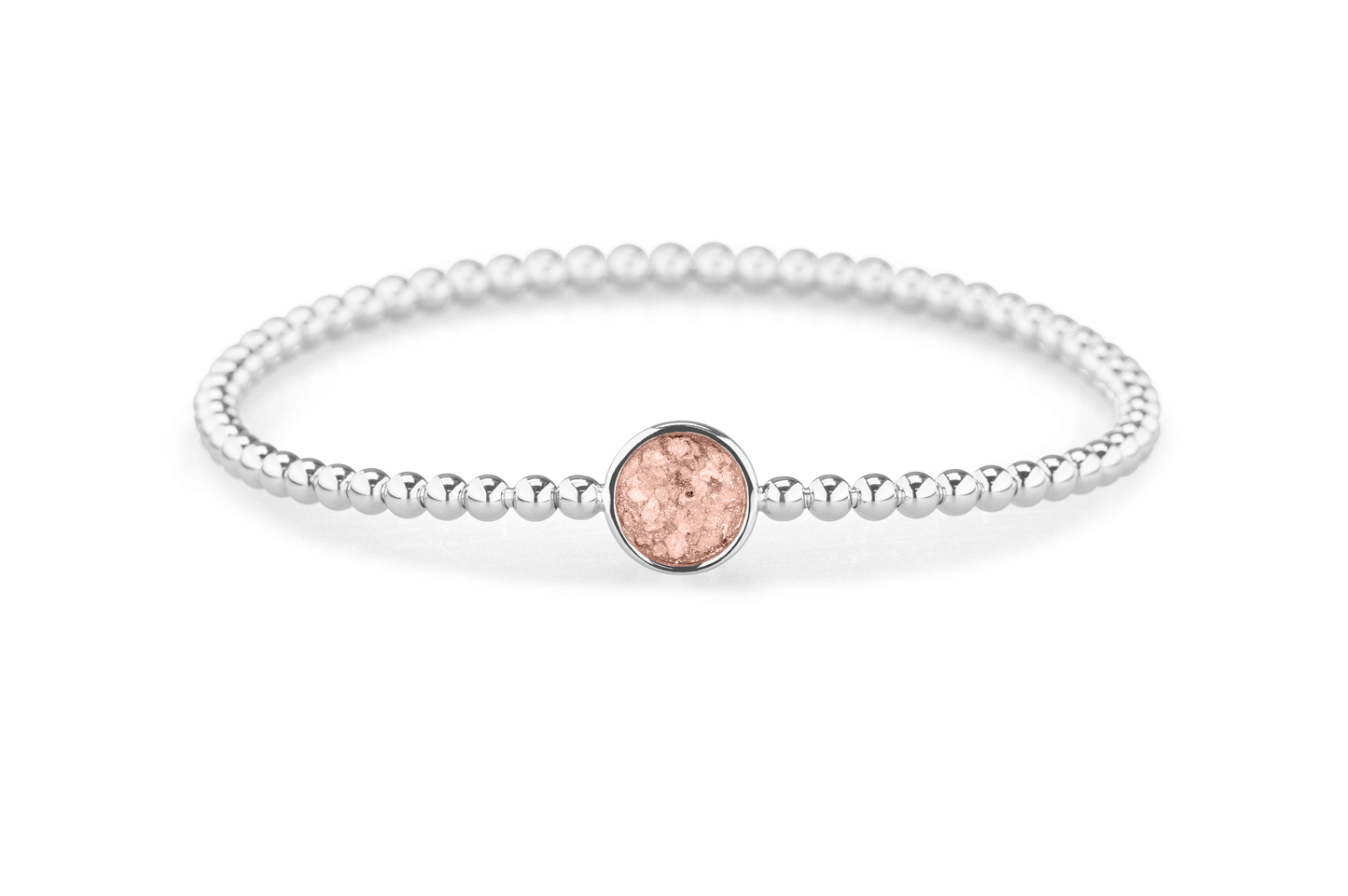 Flexibele as armband met rondje als compartiment voor as of haar, gedenksieraden. Blush