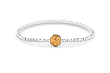 Flexibele as armband met rondje als compartiment voor as of haar, gedenksieraden. Gold