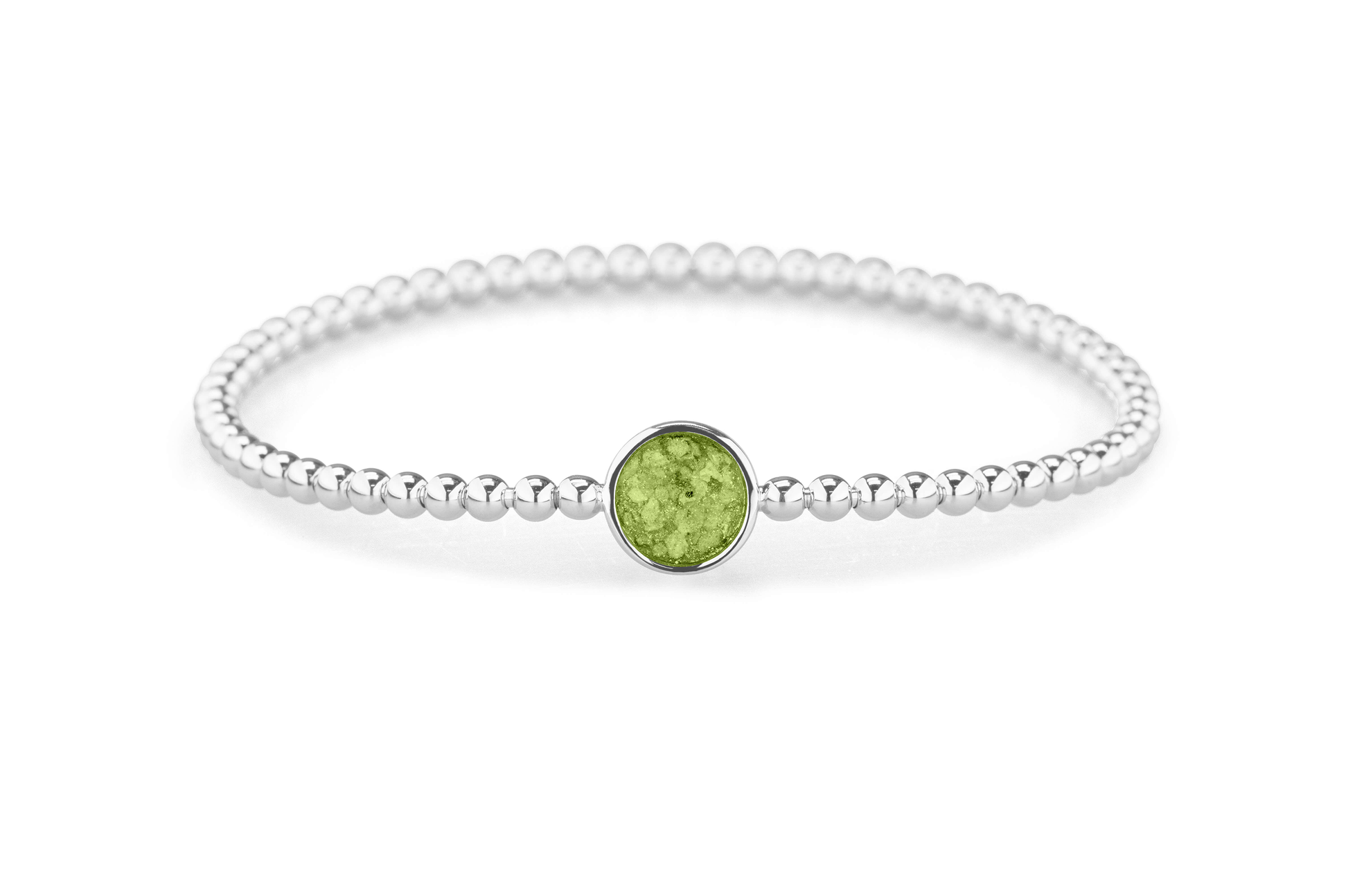 Flexibele as armband met rondje als compartiment voor as of haar, gedenksieraden. Green