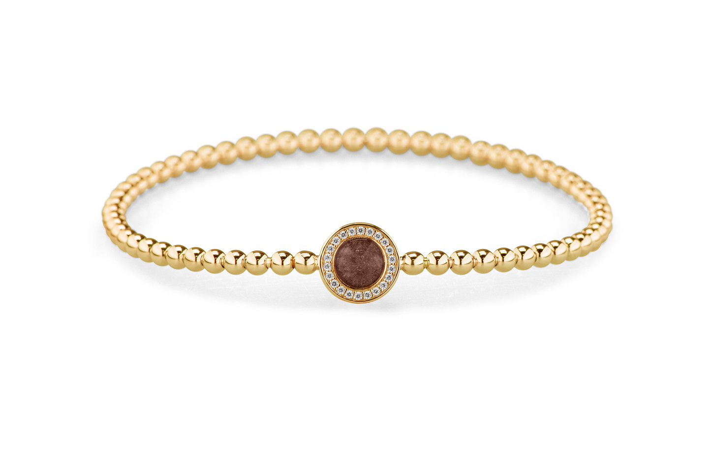 Flexibele as armband met rondje als compartiment gezet rondom met zirconia's voor as of haar. Brown