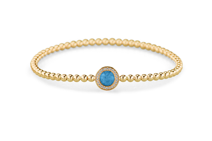 Flexibele as armband met rondje als compartiment gezet rondom met zirconia's voor as of haar. Marine