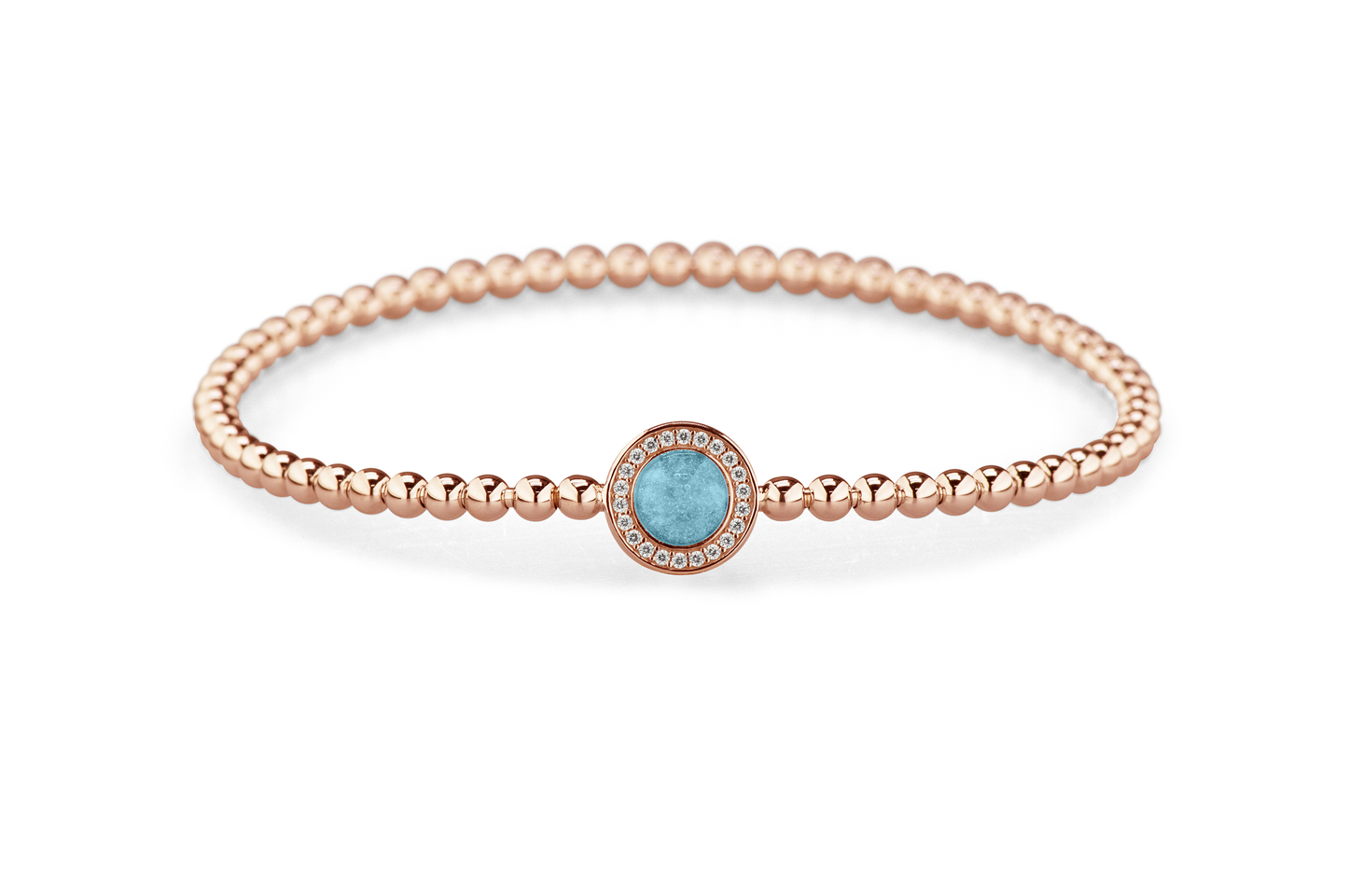 Flexibele as armband met rondje als compartiment gezet rondom met zirconia's voor as of haar. Baby