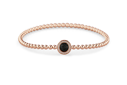 Flexibele as armband met rondje als compartiment gezet rondom met zirconia's voor as of haar. Black