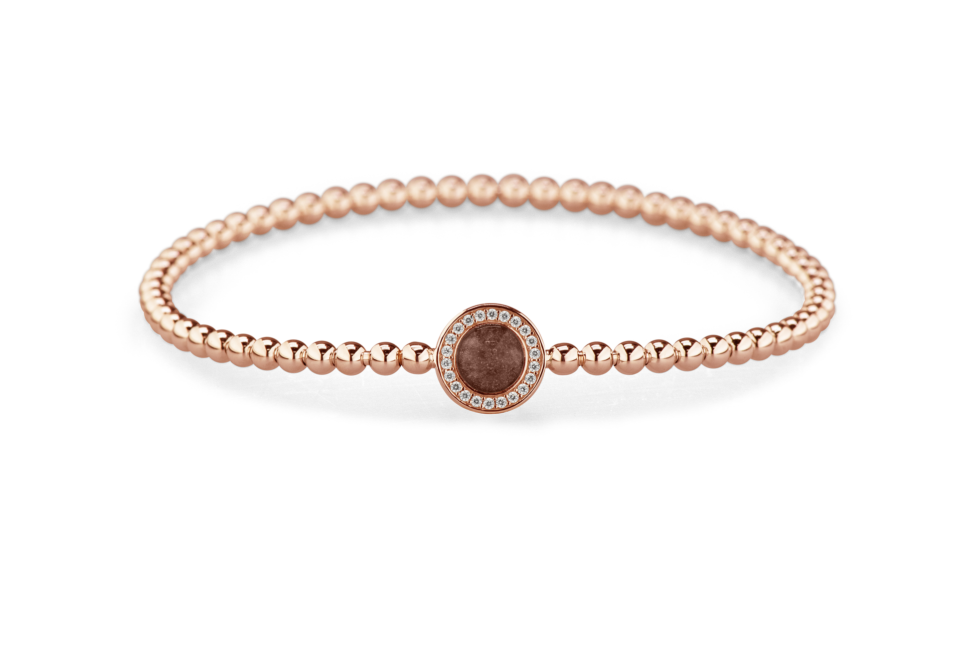 Flexibele as armband met rondje als compartiment gezet rondom met zirconia's voor as of haar. Brown