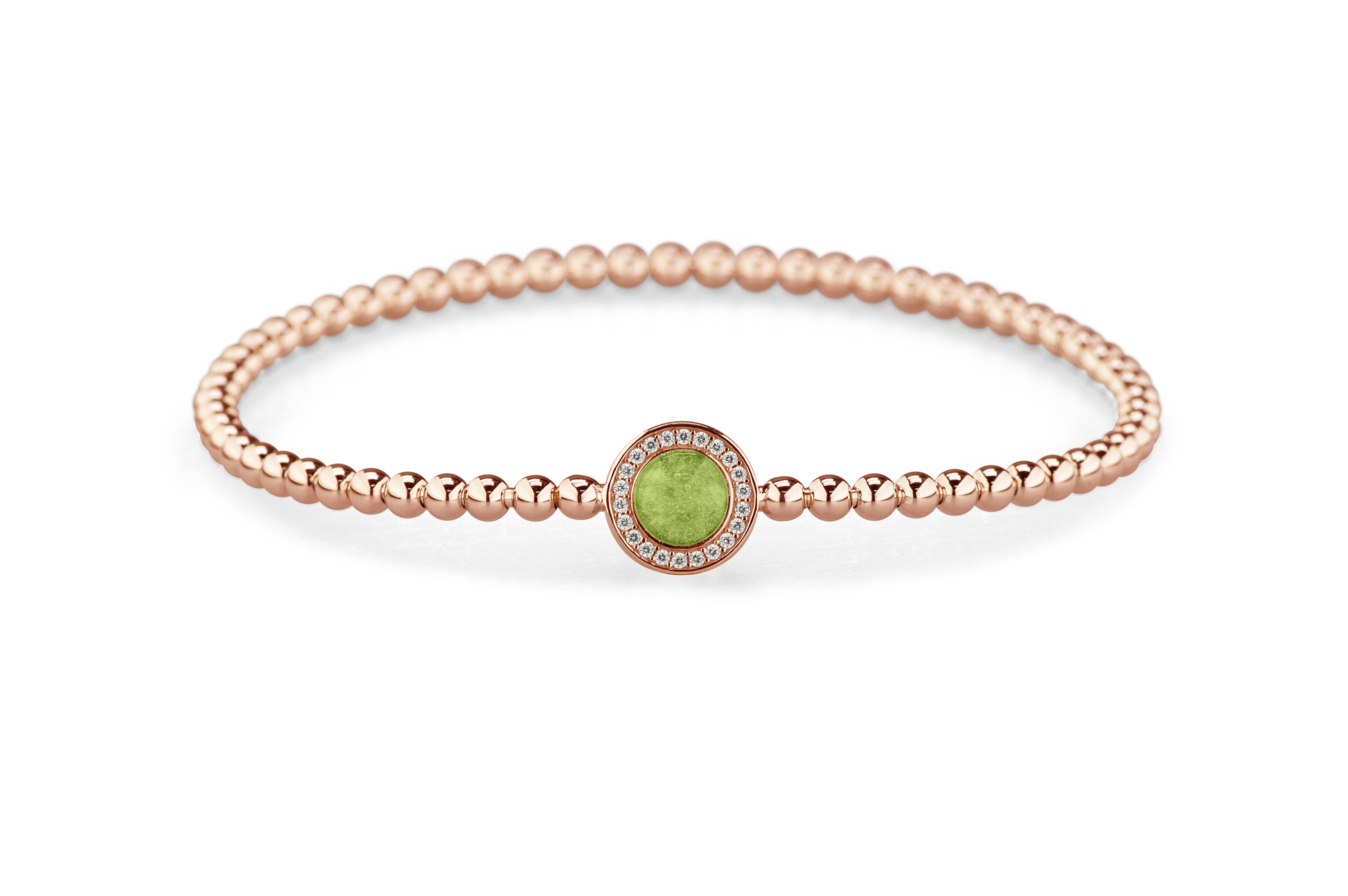 Flexibele as armband met rondje als compartiment gezet rondom met zirconia's voor as of haar. Green