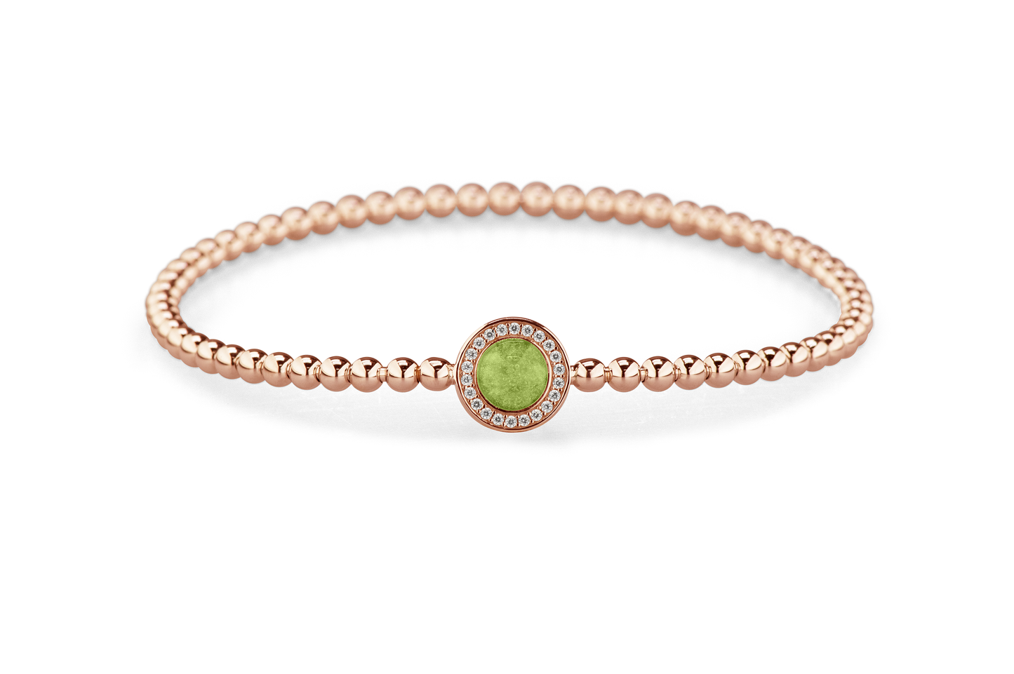 Flexibele as armband met rondje als compartiment gezet rondom met zirconia's voor as of haar. Green