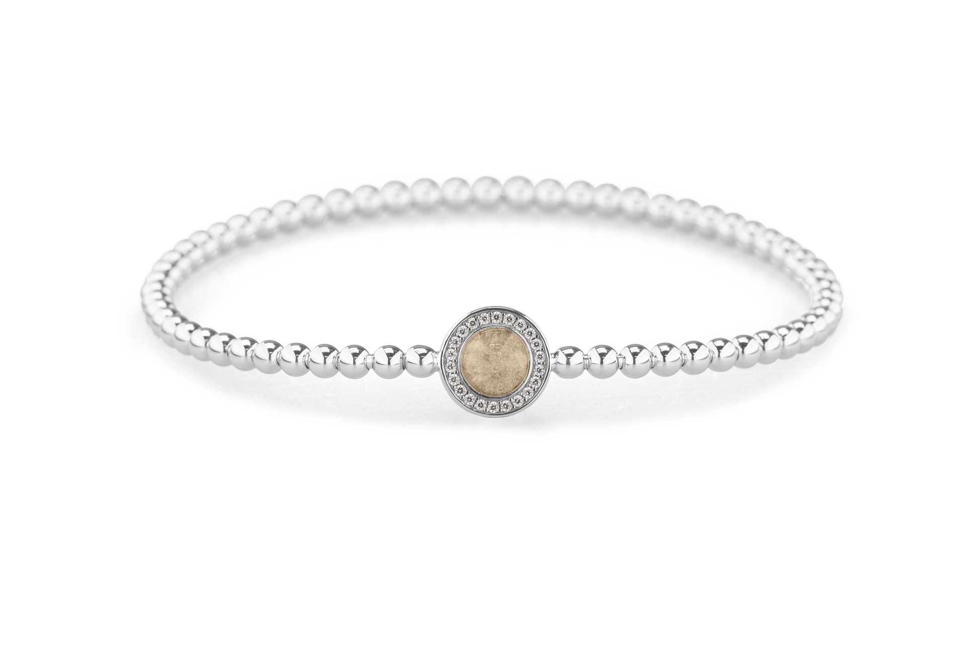 Flexibele as armband met rondje als compartiment gezet rondom met zirconia's voor as of haar. Transparent