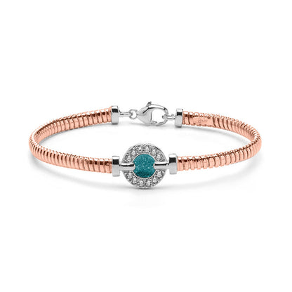 Zilveren vergulde as armband afgewerkt rondom met zirkonia's. aqua
