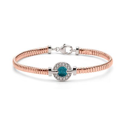 Zilveren vergulde as armband afgewerkt rondom met zirkonia's. turquoise