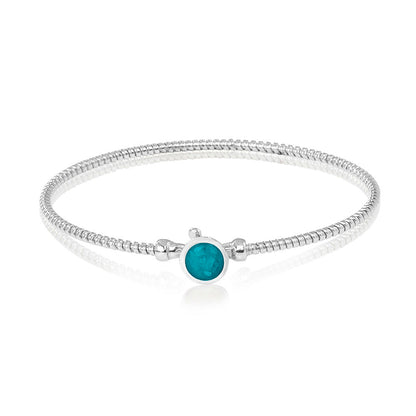 Zilveren as armband met in het midden een ornamentje, gedenksieraad. Turquoise