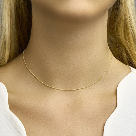 Collier gourmette geelgoud