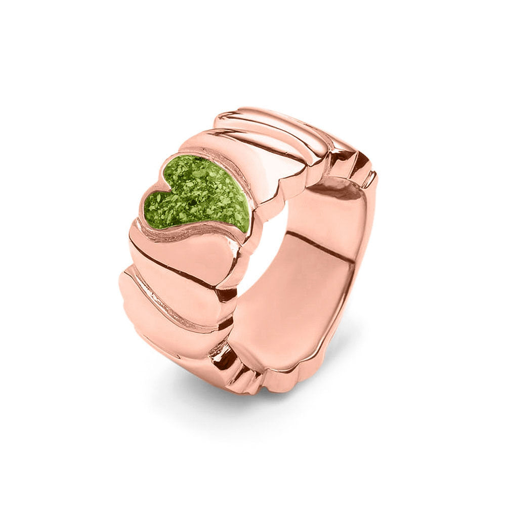 Ring 12 mm uit onze serie gedenksieraden, waar aan de bovenzijde zichtbaar as of haar verwerkt wordt in een hartje. Green