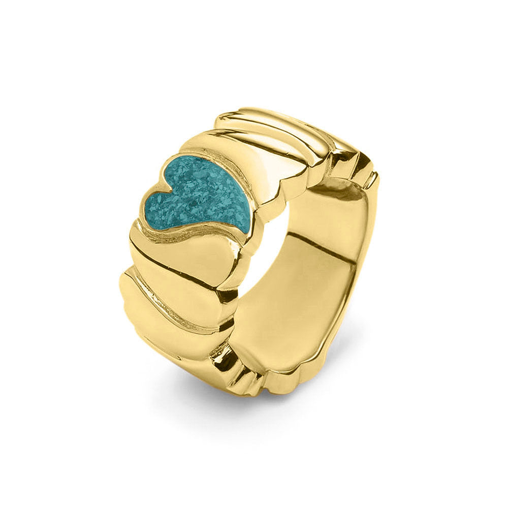 Ring 12 mm uit onze serie gedenksieraden, waar aan de bovenzijde zichtbaar as of haar verwerkt wordt in een hartje. Aqua