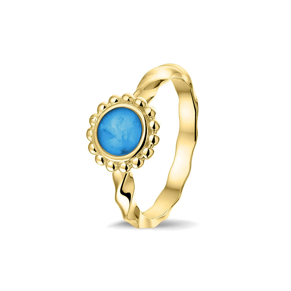 Gedenksieraad, asring 4 mm waar aan de bovenzijde in ovaalvorm met parelrand zichtbaar as of haar (of eventueel melktandjes of moedermelk) verwerkt wordt. Marine