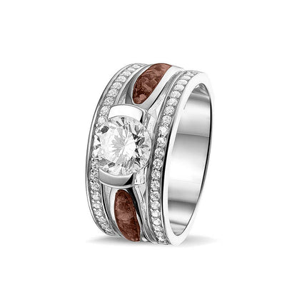 Asring 10 mm uit onze serie gedenksieraden, waar aan de bovenzijde zichtbaar as of haar verwerkt wordt in twee separate compartimenten met in het midden een zirkonia. Brown