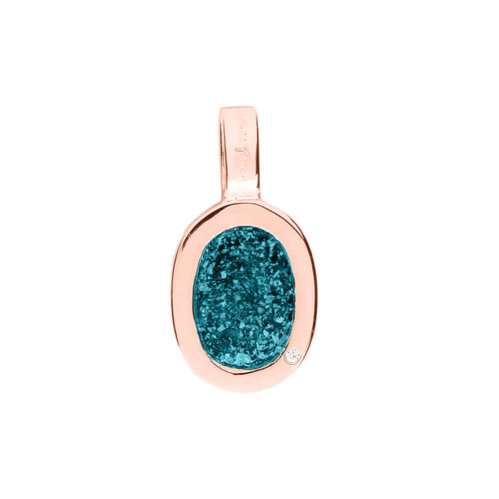 Ovale platte ashanger, gedenksieraad, waar as en haar in verwerkt wordt. Turquoise