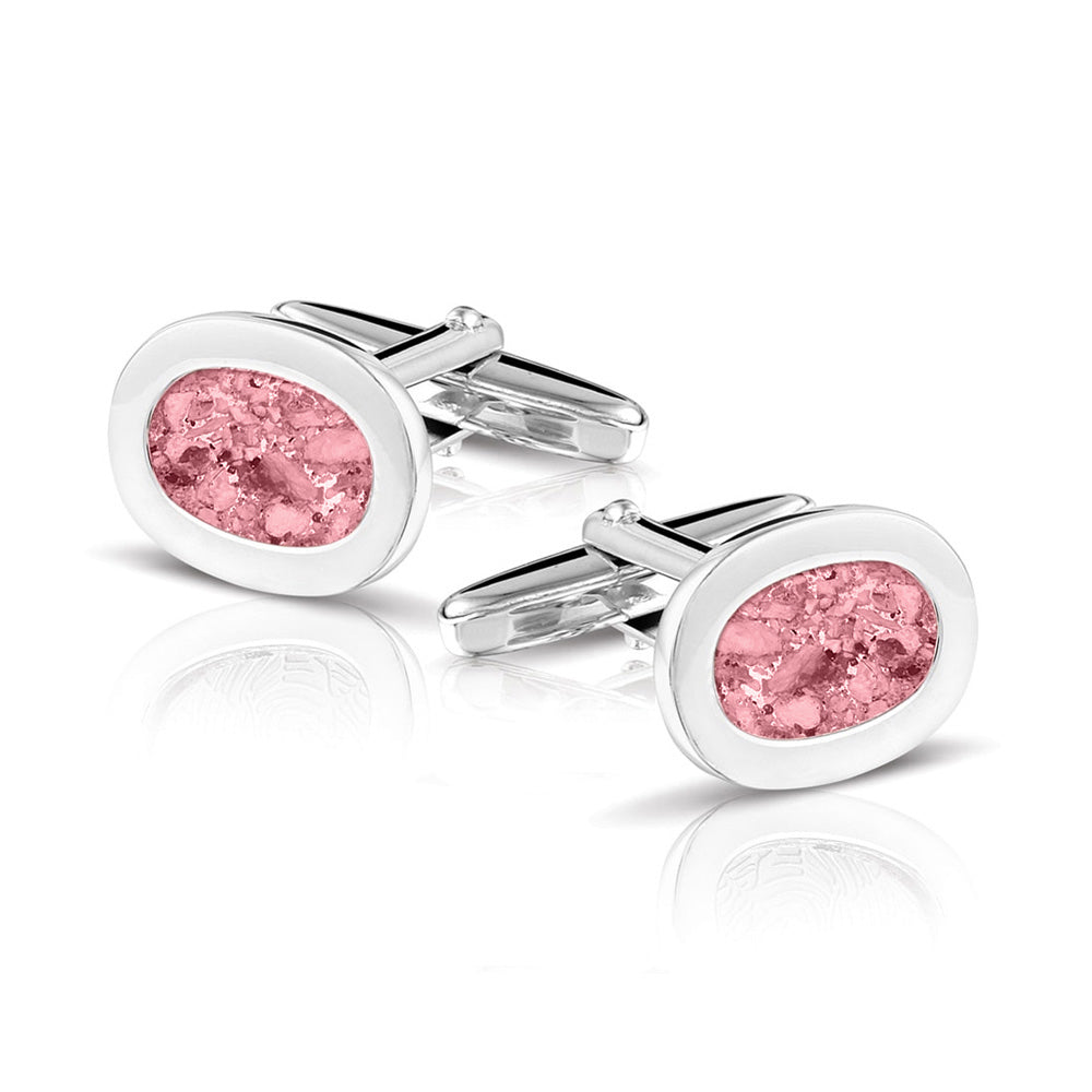 Manchetknopen met as, zichtbaar gevuld, als herinneringssieraad. Soft