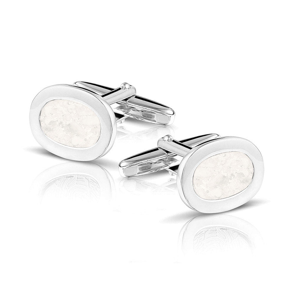Manchetknopen met as, zichtbaar gevuld, als herinneringssieraad. white