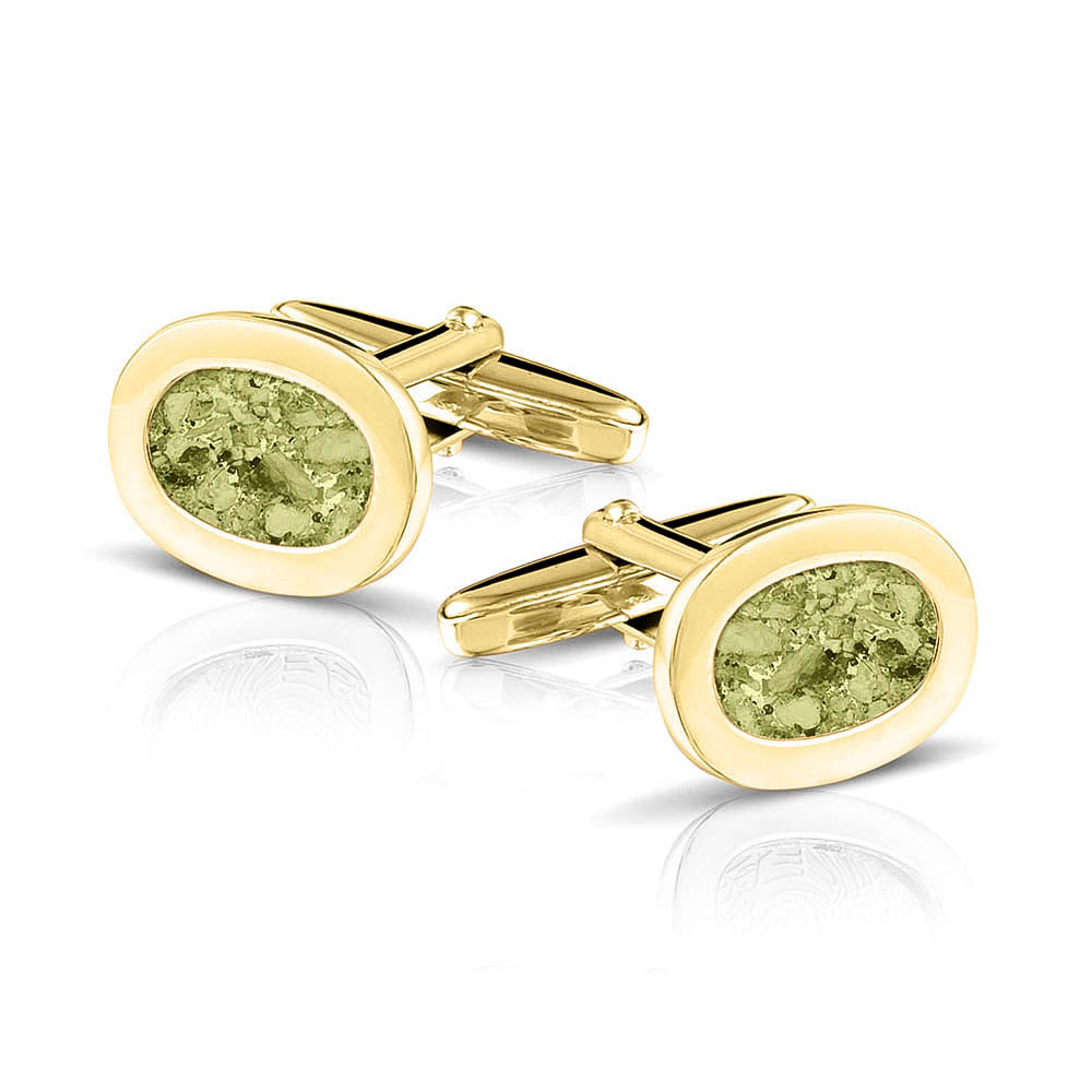 Manchetknopen met as, zichtbaar gevuld, als herinneringssieraad. olive