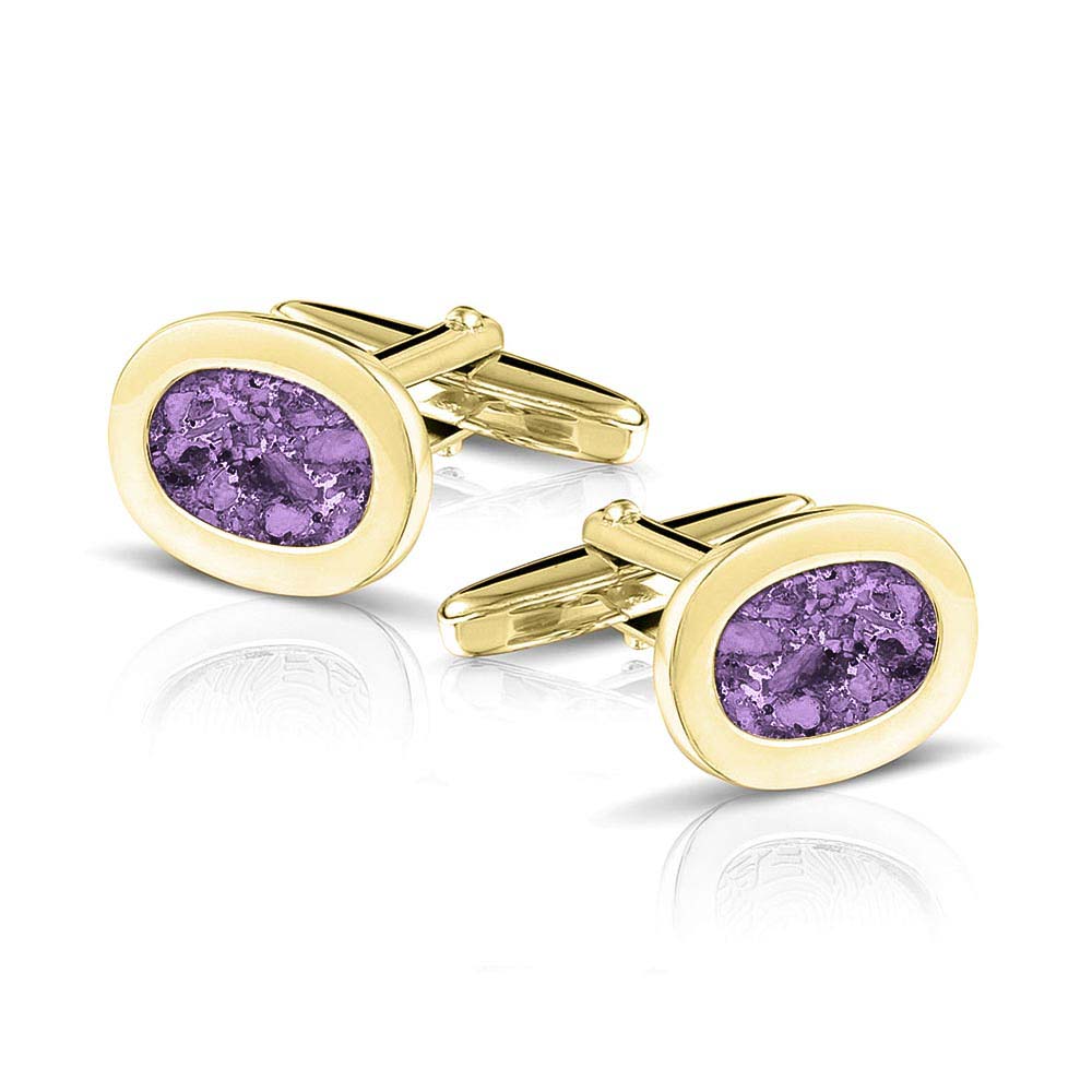 Manchetknopen met as, zichtbaar gevuld, als herinneringssieraad. purple