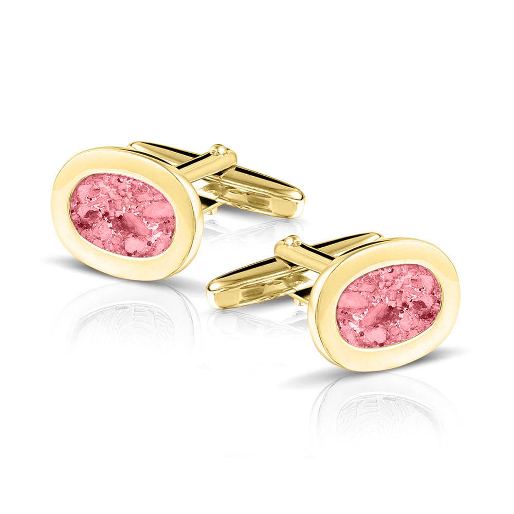 Manchetknopen met as, zichtbaar gevuld, als herinneringssieraad. Soft