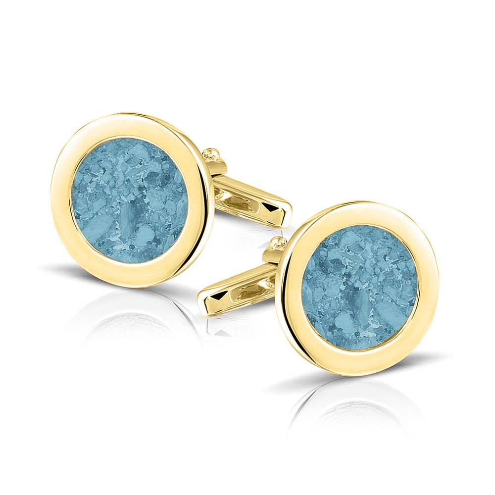 Ronde manchetknopen met as, zichtbaar gevuld, als herinneringssieraad. Baby