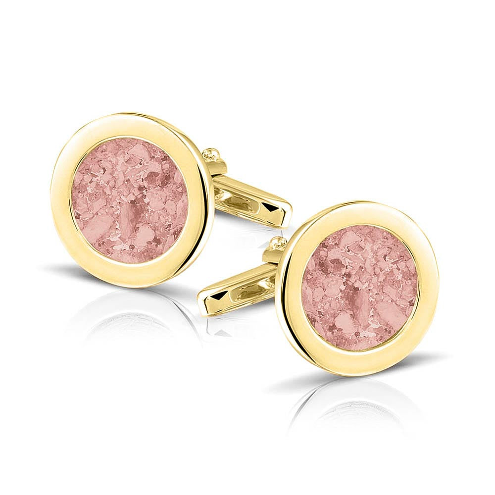 Ronde manchetknopen met as, zichtbaar gevuld, als herinneringssieraad. Blush