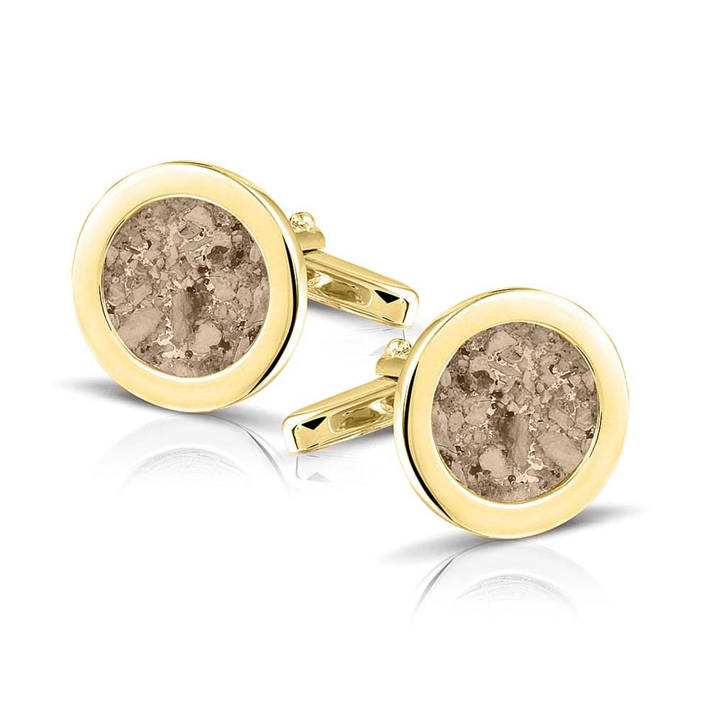 Ronde manchetknopen met as, zichtbaar gevuld, als herinneringssieraad. Transparent