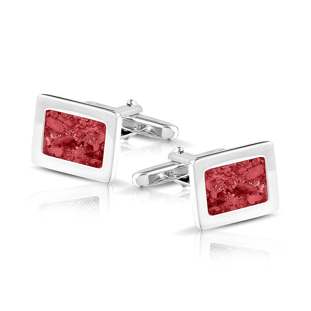 Manchetknopen met as, zichtbaar gevuld, als herinneringssieraad. red