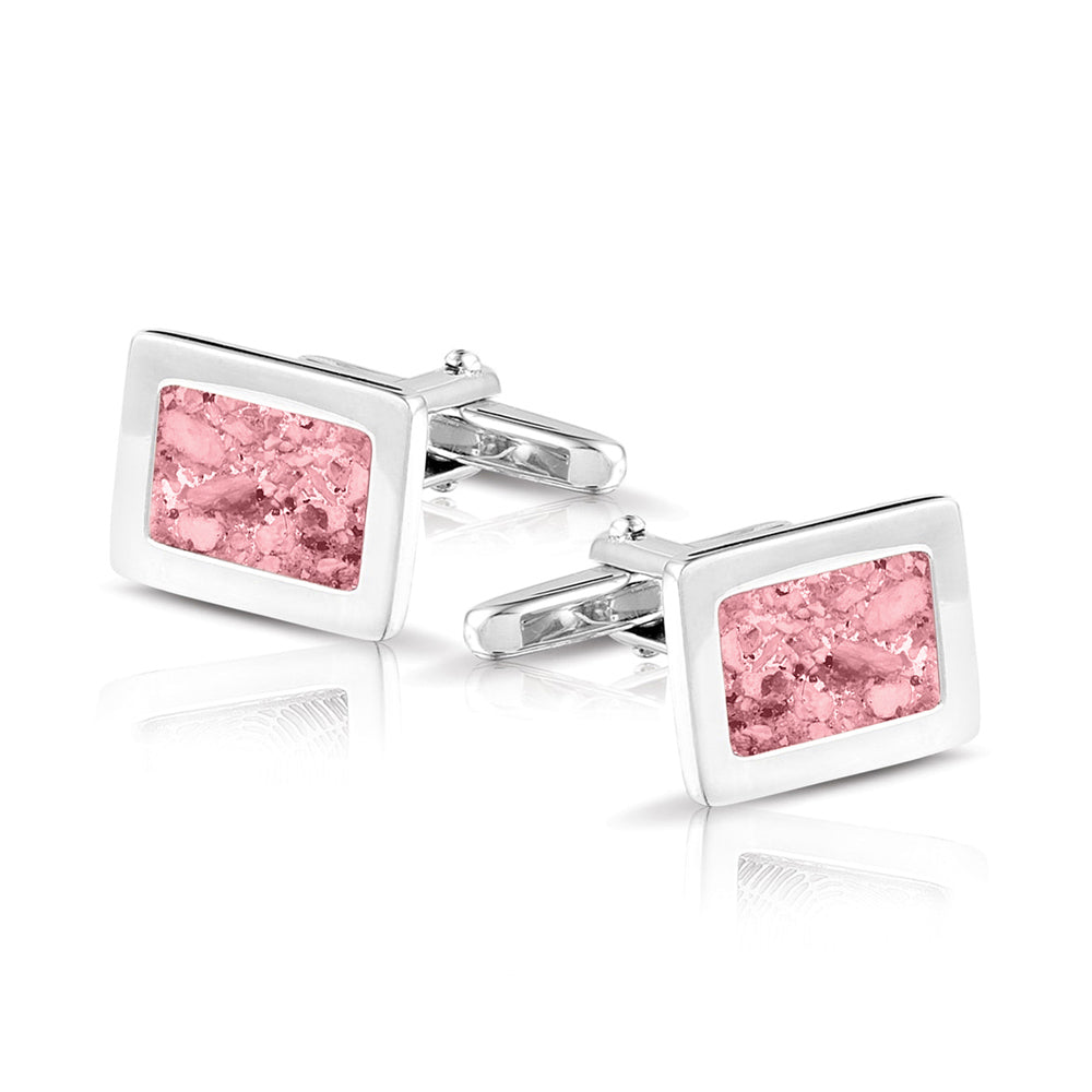 Manchetknopen met as, zichtbaar gevuld, als herinneringssieraad. soft