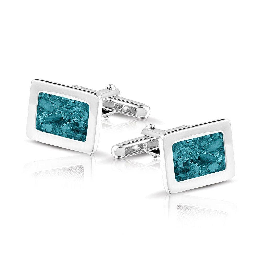 Manchetknopen met as, zichtbaar gevuld, als herinneringssieraad. turquoise