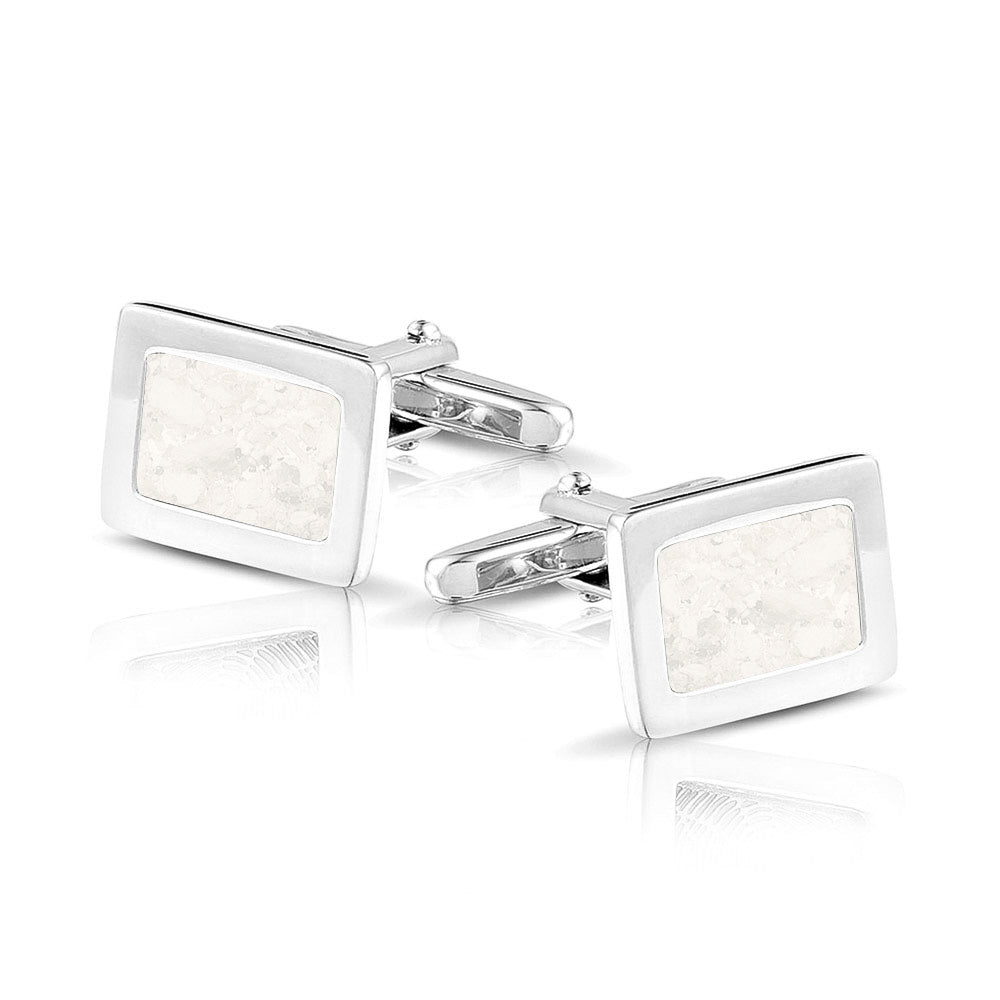 Manchetknopen met as, zichtbaar gevuld, als herinneringssieraad. white