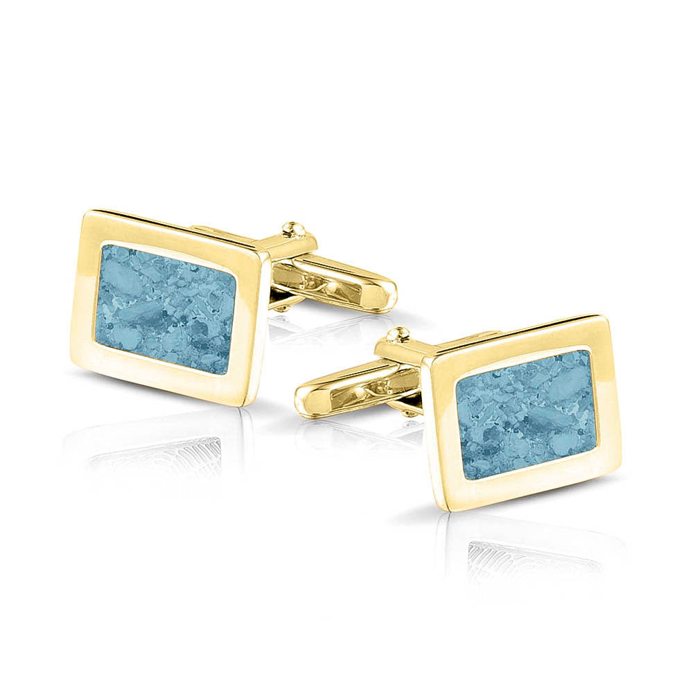 Manchetknopen met as, zichtbaar gevuld, als herinneringssieraad. baby